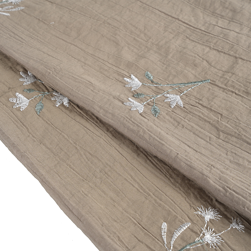 Vrásčitá látka na vyšívání květů se semínky broskvové orchideje