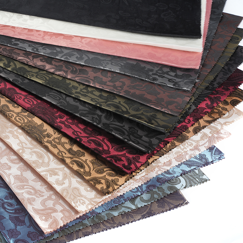 Polyesterový žakár s vroubkovaným květem